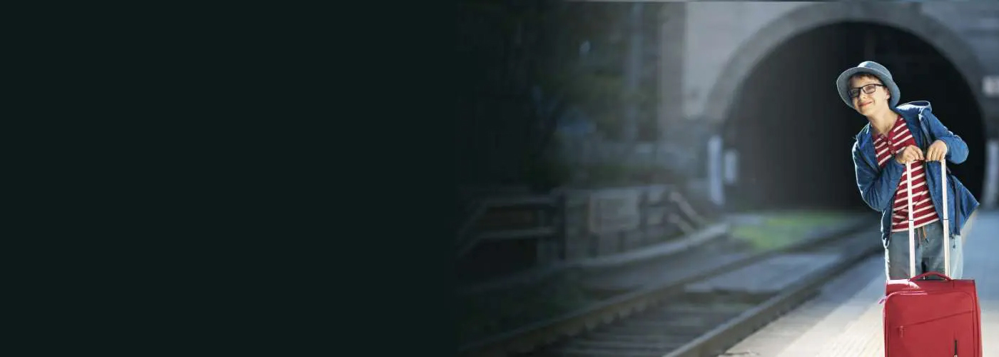 Boy Waiting for Train